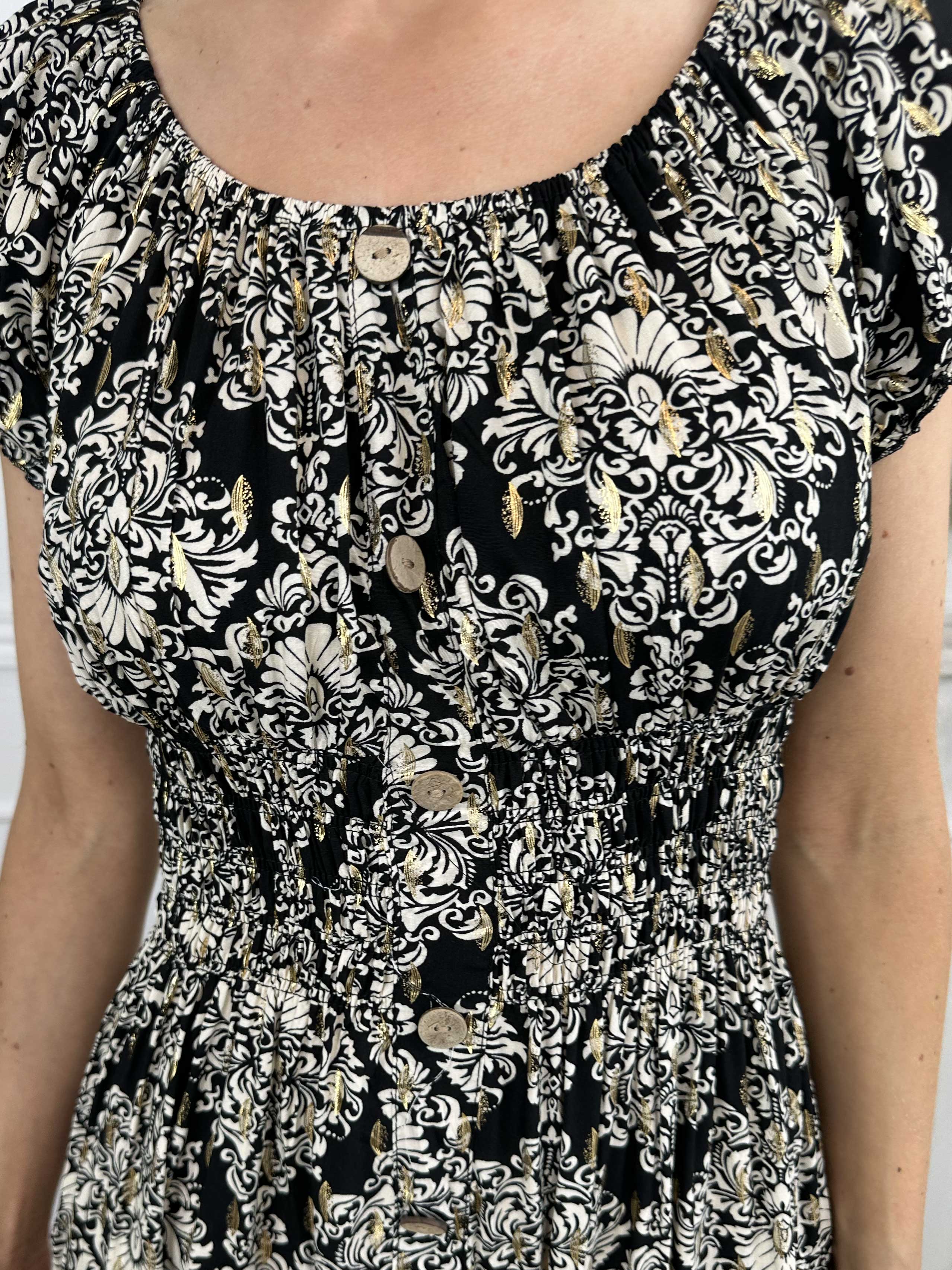 Elise - Lång mönstrad klänning med elastisk halsringning